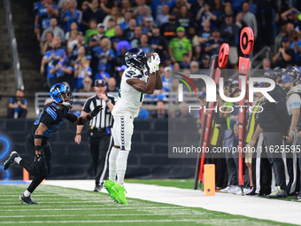 DETROIT,MICHIGAN-September 30: Seattle Seahawks wide receiver DK Metcalf (14) catches a pass during the first half of an NFL football game b...