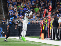 DETROIT,MICHIGAN-September 30: Seattle Seahawks wide receiver DK Metcalf (14) catches a pass during the first half of an NFL football game b...