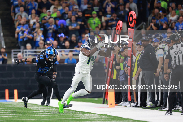 DETROIT,MICHIGAN-September 30: Seattle Seahawks wide receiver DK Metcalf (14) catches a pass during the first half of an NFL football game b...