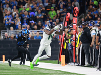 DETROIT,MICHIGAN-September 30: Seattle Seahawks wide receiver DK Metcalf (14) catches a pass during the first half of an NFL football game b...