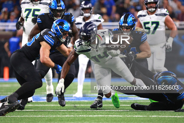 DETROIT,MICHIGAN-September 30: Seattle Seahawks wide receiver DK Metcalf (14) runs the ball during the first half of an NFL football game be...