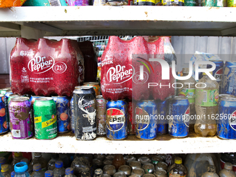 Damaged products sit on a shelf outside of CJ's Market in Lansing, North Carolina on September 30, 2024 after Hurricane Helene destroyed the...