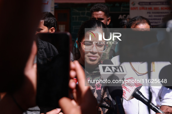 DC Kupwara Ayushi Sudan speaks to the media near a polling station during the third phase of Assembly elections in Handwara, Jammu and Kashm...