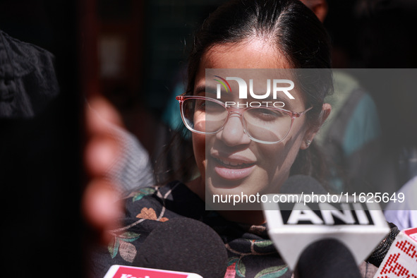 DC Kupwara Ayushi Sudan speaks to the media near a polling station during the third phase of Assembly elections in Handwara, Jammu and Kashm...