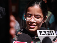 DC Kupwara Ayushi Sudan speaks to the media near a polling station during the third phase of Assembly elections in Handwara, Jammu and Kashm...