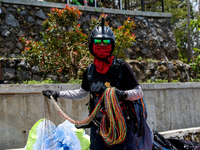 A number of paragliding athletes prepare to take part in a paragliding competition in Sumedang, Indonesia, on October 1, 2024. The paraglidi...