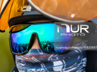 A paragliding athlete prepares to take part in a paragliding competition in Sumedang, Indonesia, on October 1, 2024. The paragliding competi...