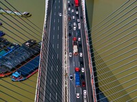 A large number of vehicles move slowly along an expressway in Huai'an, China, on October 1, 2024. (