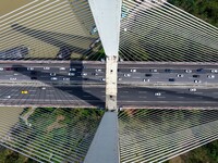 A large number of vehicles move slowly along an expressway in Huai'an, China, on October 1, 2024. (