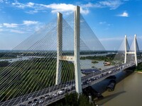 A large number of vehicles move slowly along an expressway in Huai'an, China, on October 1, 2024. (