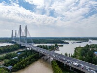 A large number of vehicles move slowly along an expressway in Huai'an, China, on October 1, 2024. (