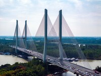 A large number of vehicles move slowly along an expressway in Huai'an, China, on October 1, 2024. (