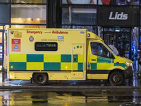 Ambulance in London. Emergency Services Ambulance Vehicle of NHS London Ambulance Service spotted during the night in the streets of Soho in...