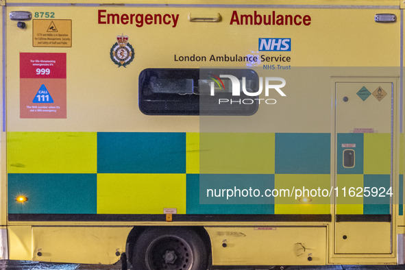 Ambulance in London. Emergency Services Ambulance Vehicle of NHS London Ambulance Service spotted during the night in the streets of Soho in...