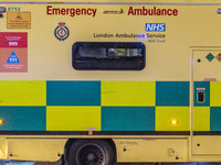 Ambulance in London. Emergency Services Ambulance Vehicle of NHS London Ambulance Service spotted during the night in the streets of Soho in...