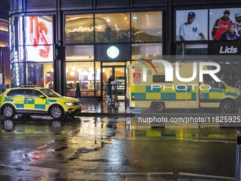 Ambulance in London. Emergency Services Ambulance Vehicle of NHS London Ambulance Service spotted during the night in the streets of Soho in...