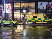 Ambulance in London. Emergency Services Ambulance Vehicle of NHS London Ambulance Service spotted during the night in the streets of Soho in...