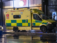 Ambulance in London. Emergency Services Ambulance Vehicle of NHS London Ambulance Service spotted during the night in the streets of Soho in...