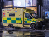 Ambulance in London. Emergency Services Ambulance Vehicle of NHS London Ambulance Service spotted during the night in the streets of Soho in...