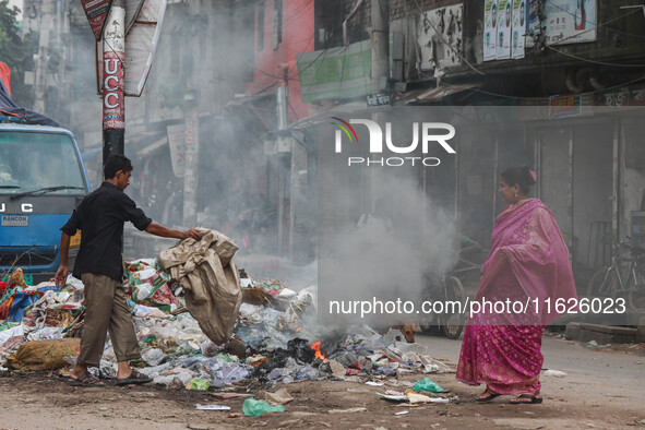 People face significant challenges while crossing the street due to air pollution, which adversely affects their health and daily lives in D...