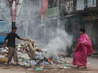 People face significant challenges while crossing the street due to air pollution, which adversely affects their health and daily lives in D...