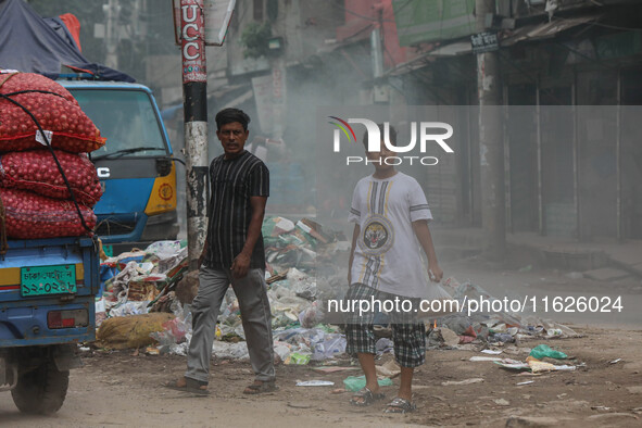 People face significant challenges while crossing the street due to air pollution, which adversely affects their health and daily lives in D...