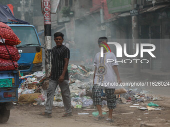 People face significant challenges while crossing the street due to air pollution, which adversely affects their health and daily lives in D...