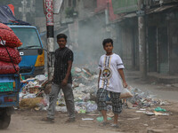 People face significant challenges while crossing the street due to air pollution, which adversely affects their health and daily lives in D...