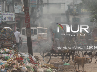 People face significant challenges while crossing the street due to air pollution, which adversely affects their health and daily lives in D...