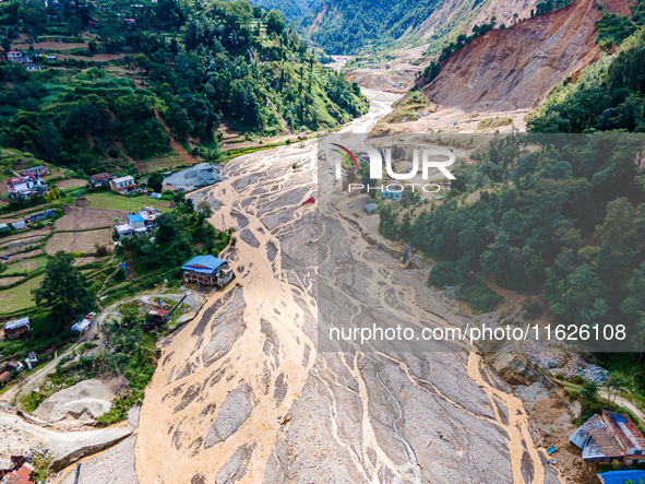 The aerial view shows the flood-affected areas of the Nakhu River in the Tikabhairab region of southern Lalitpur, Nepal, on October 01, 2024...