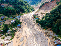 The aerial view shows the flood-affected areas of the Nakhu River in the Tikabhairab region of southern Lalitpur, Nepal, on October 01, 2024...