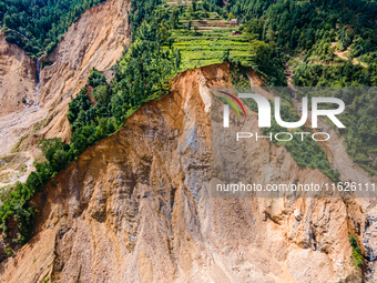 The aerial view shows the flood-affected areas of the Nakhu River in the Tikabhairab region of southern Lalitpur, Nepal, on October 01, 2024...