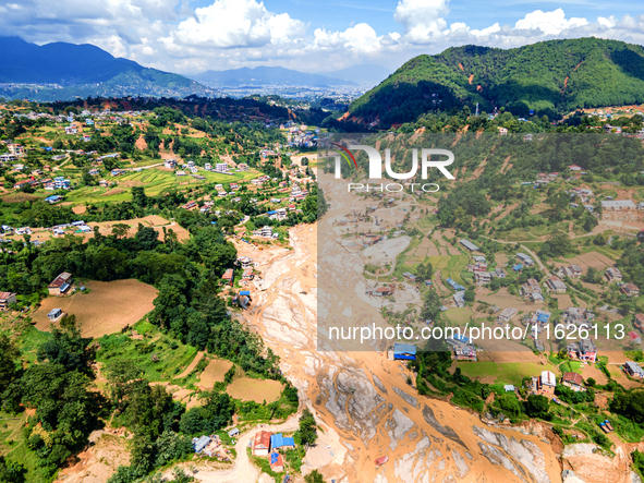 The aerial view shows the flood-affected areas of the Nakhu River in the Tikabhairab region of southern Lalitpur, Nepal, on October 01, 2024...