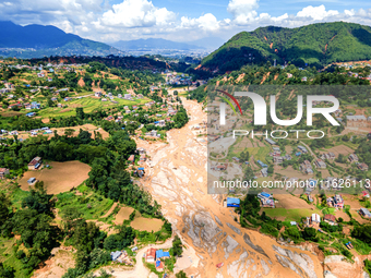 The aerial view shows the flood-affected areas of the Nakhu River in the Tikabhairab region of southern Lalitpur, Nepal, on October 01, 2024...