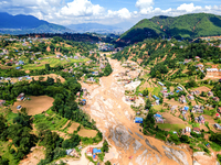 The aerial view shows the flood-affected areas of the Nakhu River in the Tikabhairab region of southern Lalitpur, Nepal, on October 01, 2024...