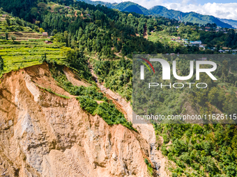 The aerial view shows the flood-affected areas of the Nakhu River in the Tikabhairab region of southern Lalitpur, Nepal, on October 01, 2024...