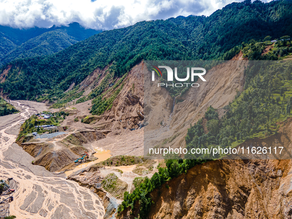 The aerial view shows the flood-affected areas of the Nakhu River in the Tikabhairab region of southern Lalitpur, Nepal, on October 01, 2024...