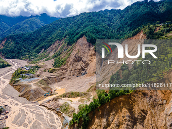 The aerial view shows the flood-affected areas of the Nakhu River in the Tikabhairab region of southern Lalitpur, Nepal, on October 01, 2024...