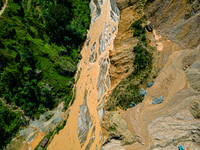 The aerial view shows the flood-affected areas of the Nakhu River in the Tikabhairab region of southern Lalitpur, Nepal, on October 01, 2024...