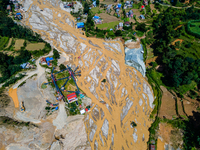 The aerial view shows the flood-affected areas of the Nakhu River in the Tikabhairab region of southern Lalitpur, Nepal, on October 01, 2024...