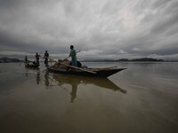 Rain clouds loom over the Brahmaputra River in Guwahati, Assam, India, on May 25, 2018. (