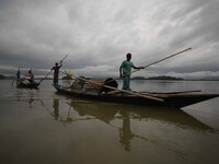 Rain clouds loom over the Brahmaputra River in Guwahati, Assam, India, on May 25, 2018. (