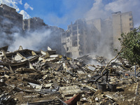 The destruction at the site of an overnight Israeli airstrike on the Laylaki, Harat Hreik, and Sant Tares neighborhoods in Beirut's southern...