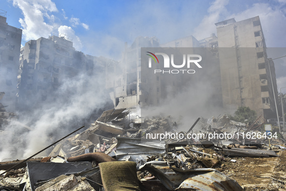 The destruction at the site of an overnight Israeli airstrike on the Laylaki, Harat Hreik, and Sant Tares neighborhoods in Beirut's southern...