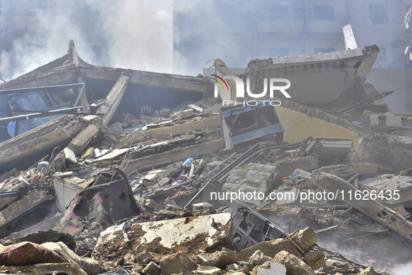 The destruction at the site of an overnight Israeli airstrike on the Laylaki, Harat Hreik, and Sant Tares neighborhoods in Beirut's southern...