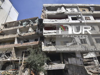 The destruction at the site of an overnight Israeli airstrike on the Laylaki, Harat Hreik, and Sant Tares neighborhoods in Beirut's southern...