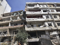 The destruction at the site of an overnight Israeli airstrike on the Laylaki, Harat Hreik, and Sant Tares neighborhoods in Beirut's southern...