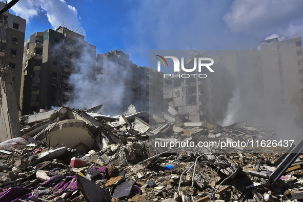 The destruction at the site of an overnight Israeli airstrike on the Laylaki, Harat Hreik, and Sant Tares neighborhoods in Beirut's southern...