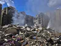 The destruction at the site of an overnight Israeli airstrike on the Laylaki, Harat Hreik, and Sant Tares neighborhoods in Beirut's southern...