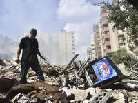 The destruction at the site of an overnight Israeli airstrike on the Laylaki, Harat Hreik, and Sant Tares neighborhoods in Beirut's southern...